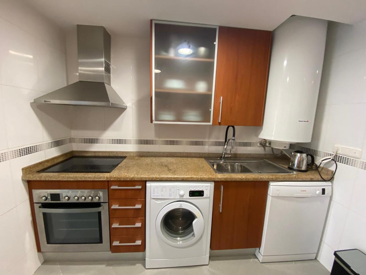 Elegant 2-Bedroom Apartment In Benidorm With Private Pool And Scenic Garden Views 卡拉德费斯特拉特 外观 照片