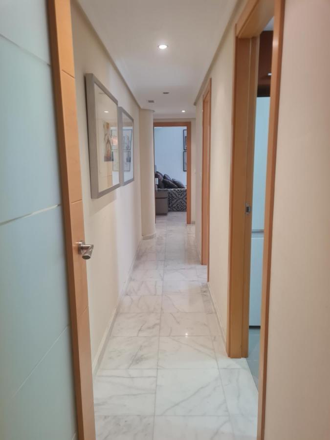 Elegant 2-Bedroom Apartment In Benidorm With Private Pool And Scenic Garden Views 卡拉德费斯特拉特 外观 照片